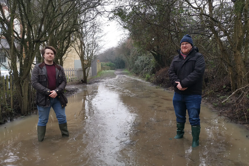 Liam Harries and David Bebbington along one of the flooded paths